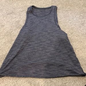 Never worn Lululemon tank top . Perfect loose fit, soft cotton material